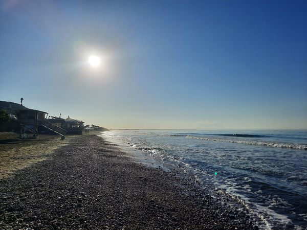 Sonnenuntergang am historischen Strand