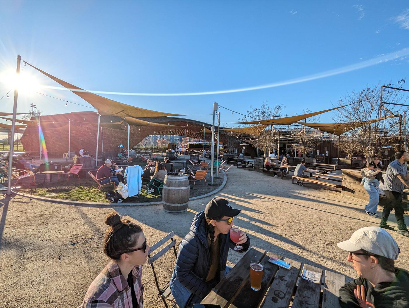 Chill outdoor vibes with beer, campfires, lawn games, picnic tables, and FOOD